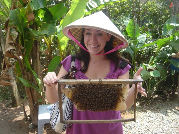 Chandra Holds Bees Mekong River Vietnam
