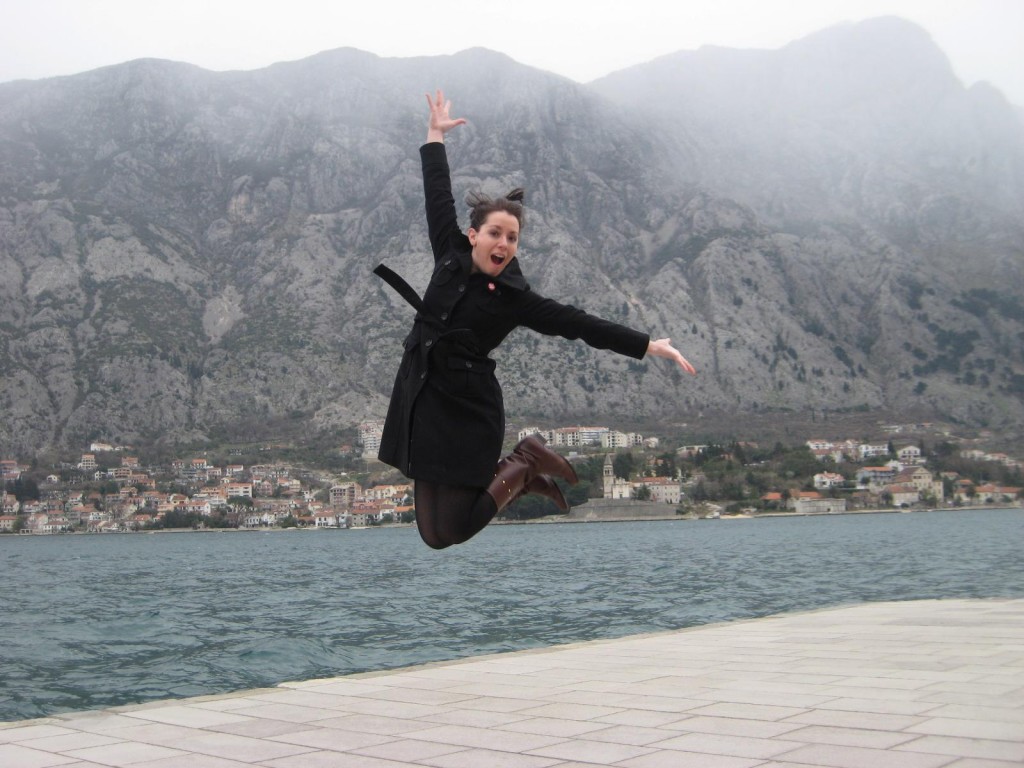 Jumping in front of Bay of Kotor, Montenegro