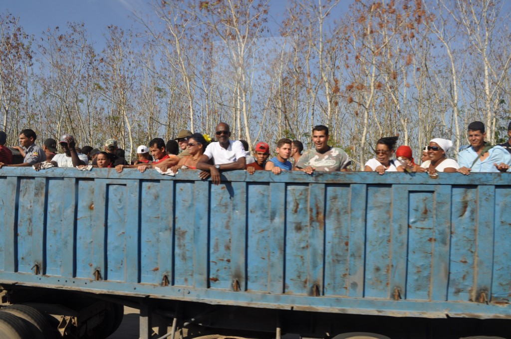 Cubans in dump truck heading to work