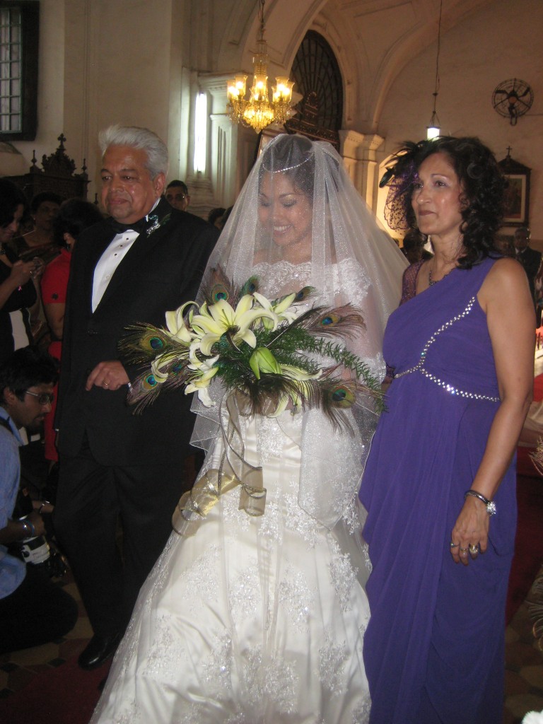 Bride walks down the aisle catholic wedding goa india