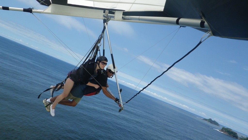 Hang gliding above the ocean in Rio de Janeiro Brazil