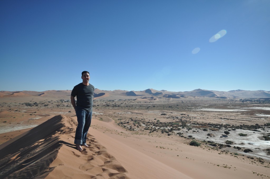 Standing at top of Sossusvlei Dunes Namibia