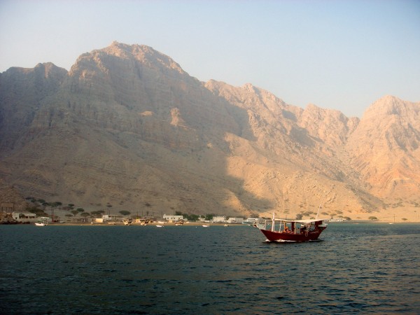 Dhow near fishing village somewhere in the fjords of Oman