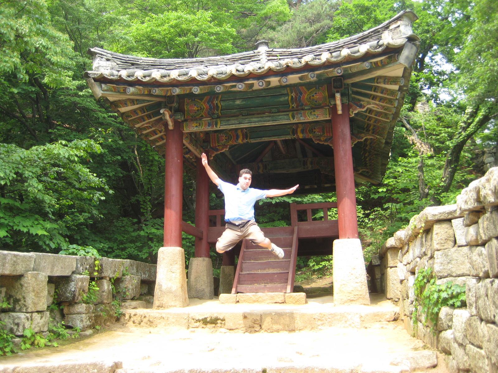 Jumping for joy in North Korea - can you believe I took this with the timer on the very first try?  Oh and Bakyeon Waterfall Pavillion behind me is pretty cool too.