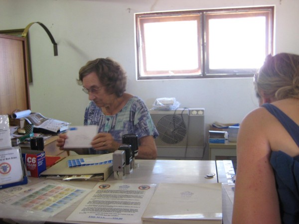 HRH Princess Shirley busy in the Hutt River central post office arranging our passport stamps and currency conversions