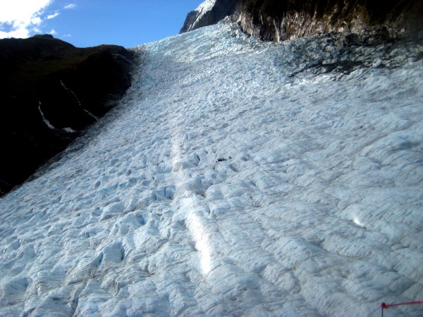 Tiny tiny people on an absolutely massive glacier.