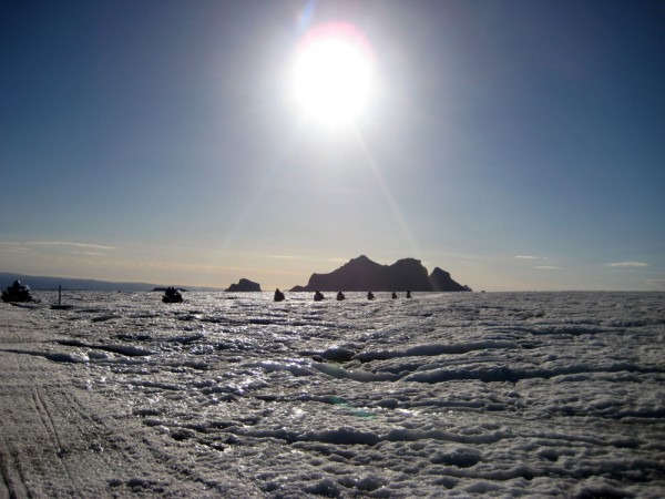 The sun high over the Langjökull Glacier shows off the barren landscape