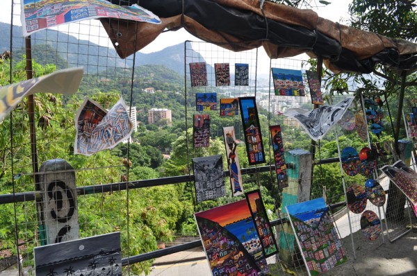 Favelas can be home to beautiful art - featuring paintings of favelas!