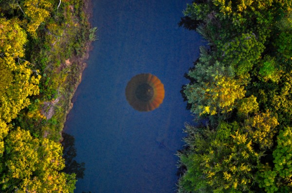 One of the coolest perspective shots I've ever taken - this is the reflection of the hot air balloon looking straight down as we passed over a river.