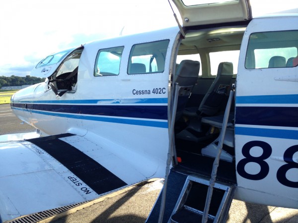 Climb aboard the Cessna 402C.  No stair car needed.