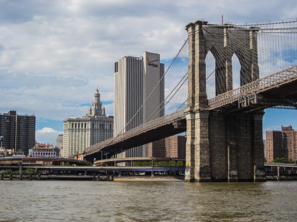 Passing under the Brooklyn Bridge and entering New York Harbor