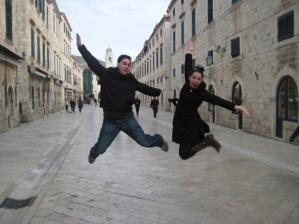 Chandra and I jump in the immaculate Old City of Dubrovnik in Croatia