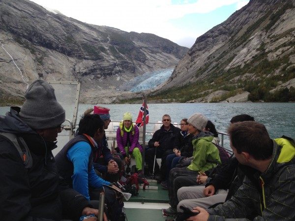 Crossing the glacial lake by boat before setting out on our trek.