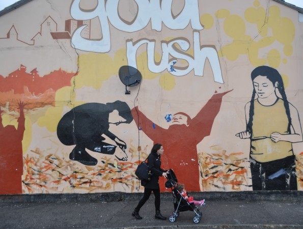 Samara & Chandra Walk with Gold Rush Mural