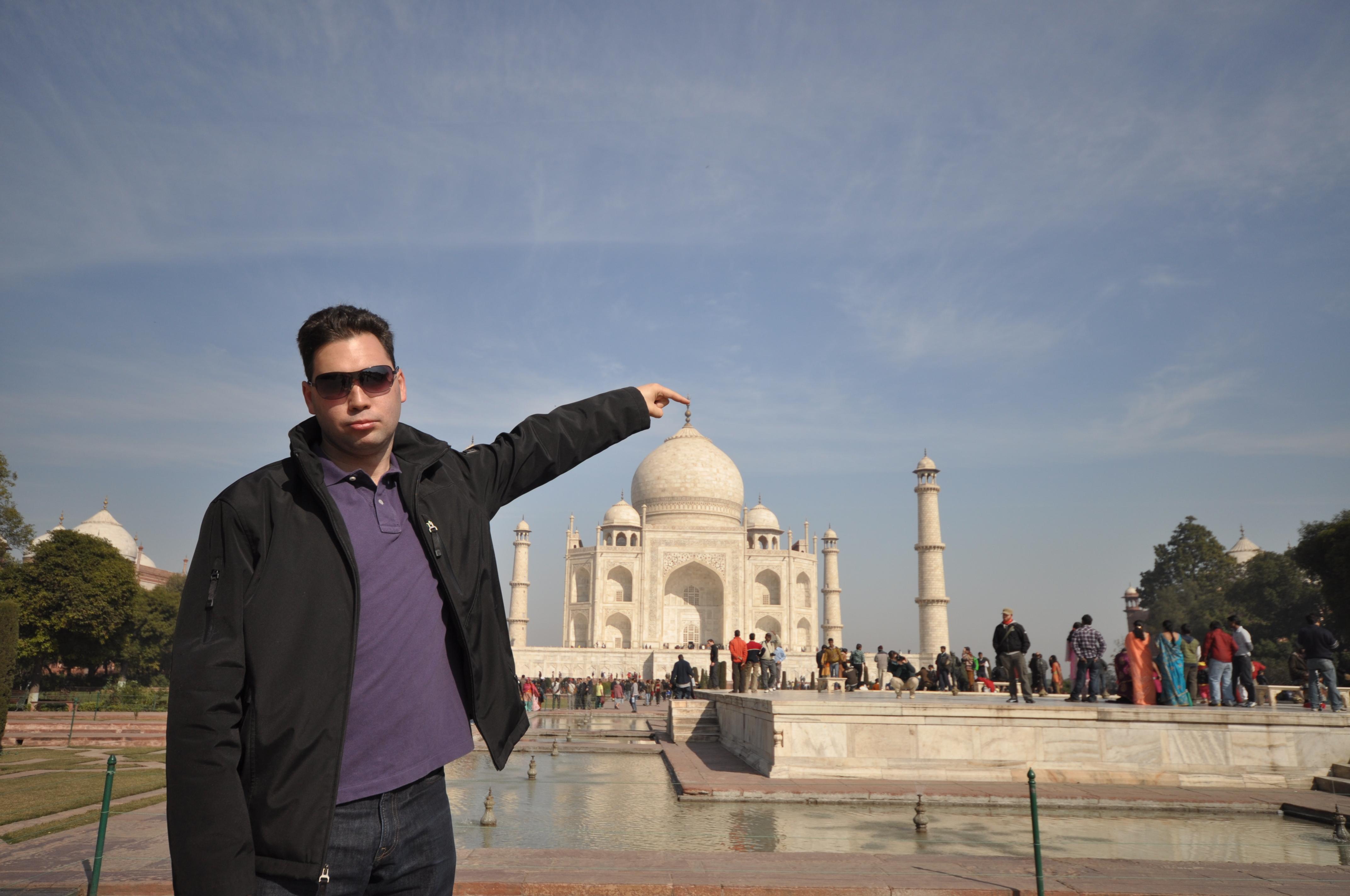 Tom Cruise poses at the historic Taj Mahal in Agra on December 3, 2011