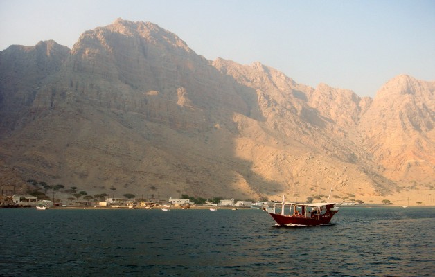 Dhow near fishing village somewhere in the fjords of Oman